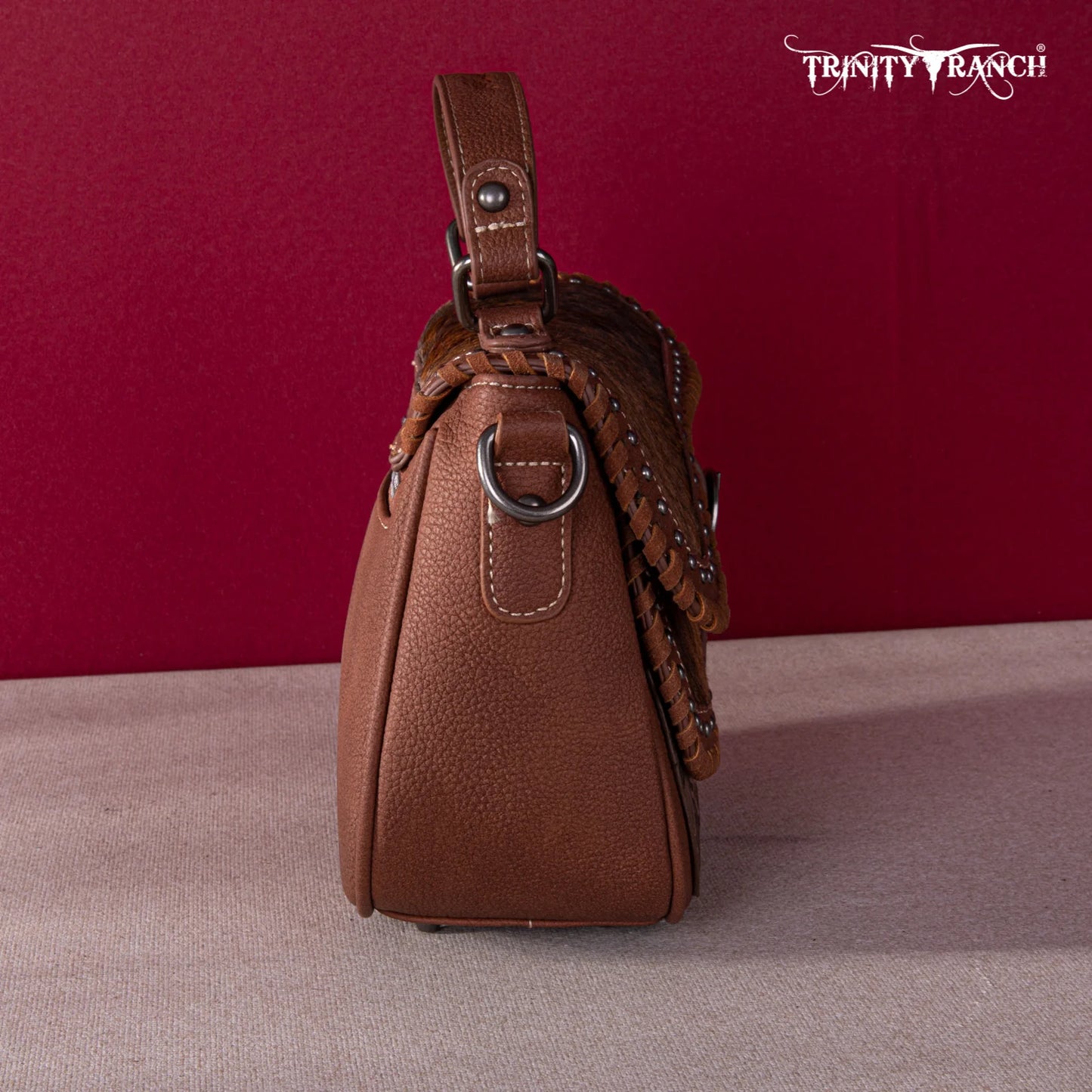 TR1498360BR - Trinity Ranch Hair-On Cowhide Saddle Shape Collection Crossbody/Satchel Brown