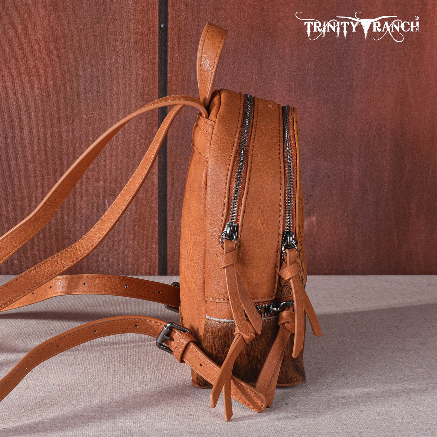 TR1609110A - Trinity Ranch Hair-On Cowhide Collection Mini Backpack