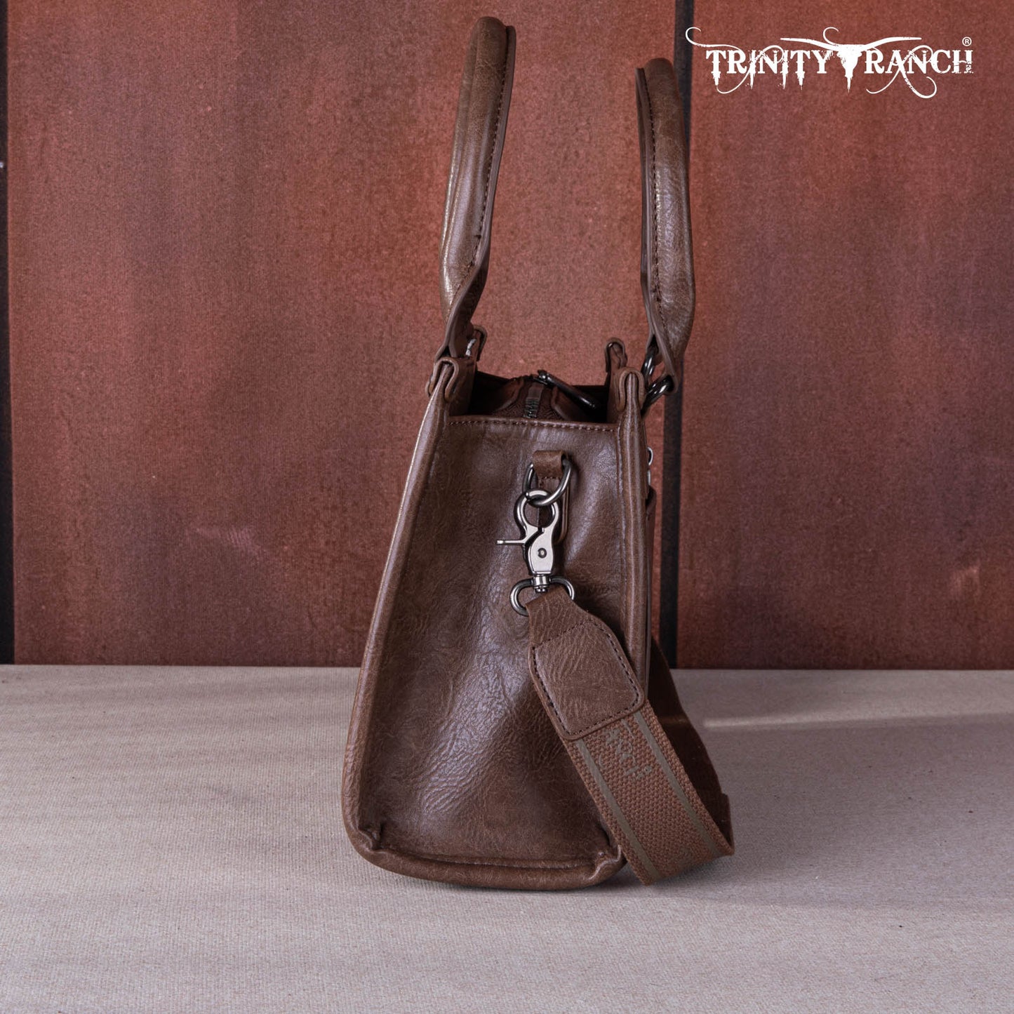 TR1648250 - Trinity Ranch Hair On Cowhide Tooling Concealed Carry Tote/Crossbody