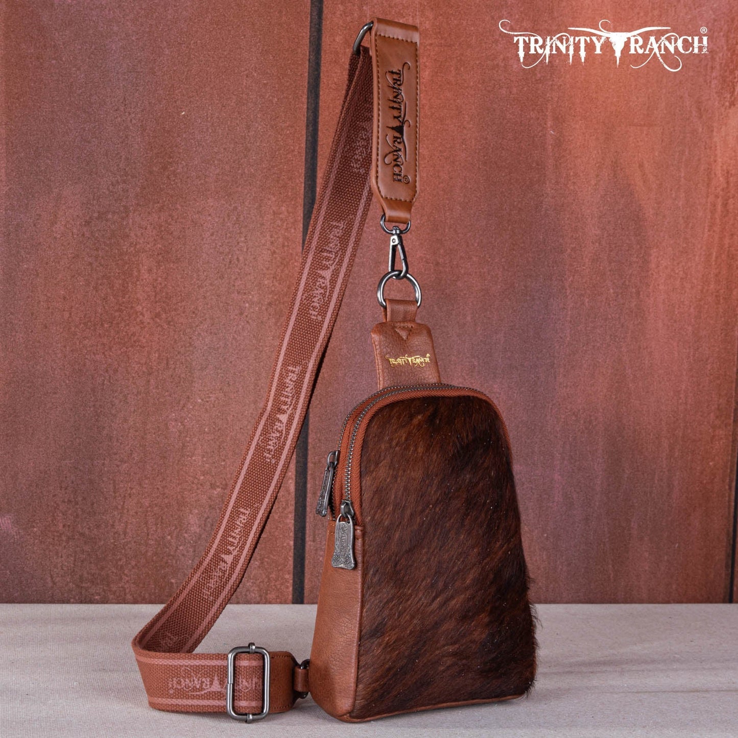 TR159210BR - Trinity Ranch Genuine Hair-On Cowhide Collection Sling Bag Brown